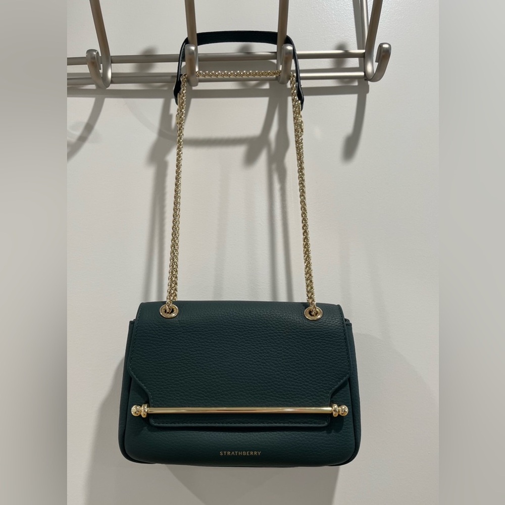like new, used once strathberry east west mini soft bag in bottle green, rare!